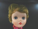 tall jointed vinyl doll red face